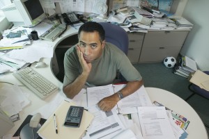 Portrait of businessman at desk
